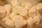 Lightly grease a plate and your fingers and slightly melt marshmallows in the microwave.  Marshmallows on plate shouldn't touch.