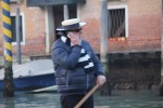 Gondolier on his cell phone.