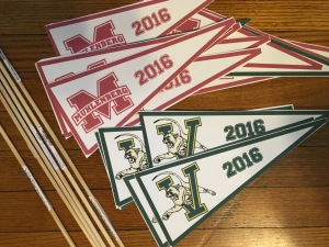 Pennants printed on card stock and dowels.